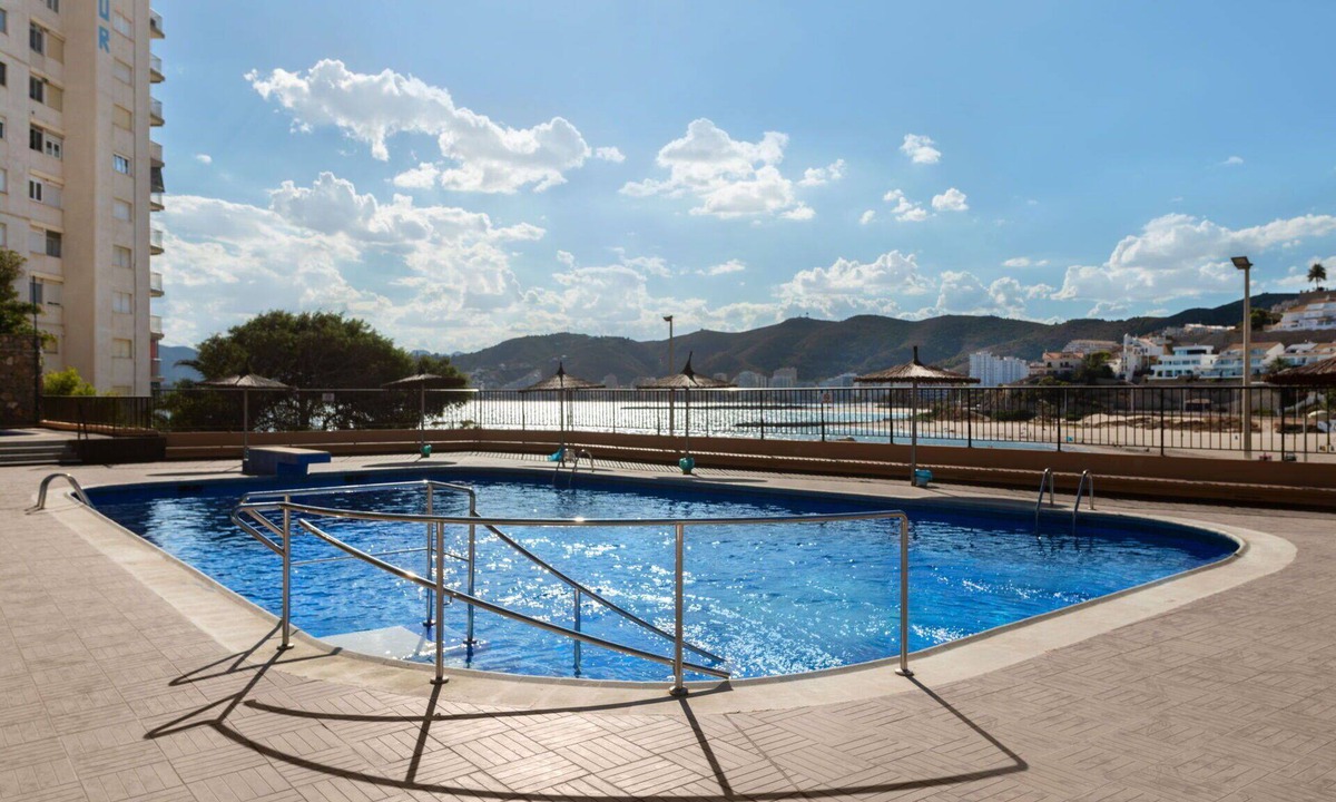 Faro de Cullera Apartment | Cosy apartment for 4 people with pool, WIFI, TV and balcony