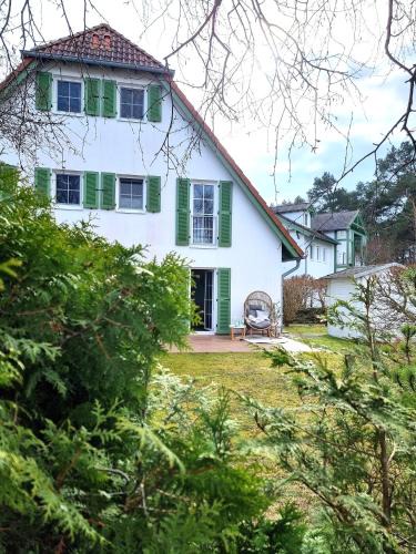 Peenemuende Apartment | Düne 4 - Ferienunterkunft mit eigenem Garten in der beliebten Dünenresidenz - sanftes Meeresrauschen inklusive