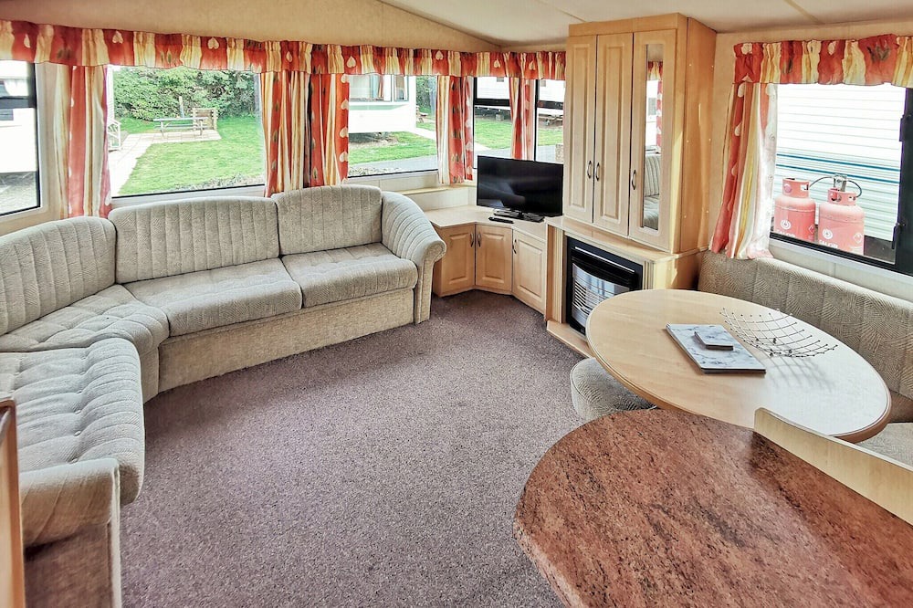 Aberystwyth House | Spacious 12ft-wide caravan with one double and one twin.