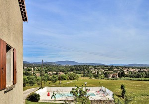 A semi-detached house attached to a farmhouse and opening onto a beautiful 1st floor terrace, with l