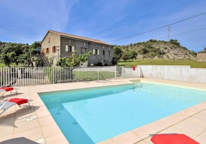 A semi-detached house attached to a farmhouse and opening onto a beautiful 1st floor terrace, with l