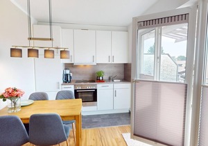 Modern vacation apartment for two people with balcony and private parking space