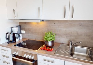 Modern vacation apartment for two people with balcony and private parking space