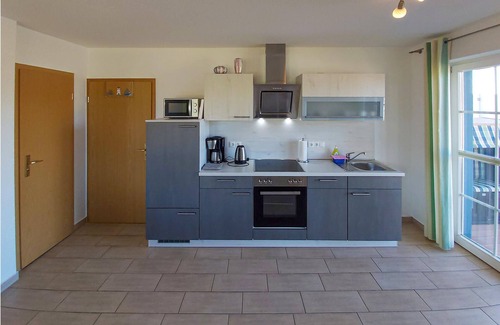 Monchgut-Granitz Apartment | "Between the Baltic Sea beach and the Bodden, the Boddenhus apartment house awaits you with its brig