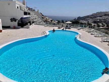 Puerto Rico Apartment | Lovely apartment seaview in Puerto Rico with heated swimming pool, free Wi-Fi and free private parking