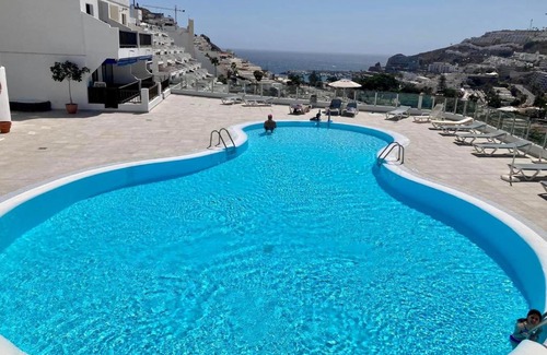 Puerto Rico Apartment | Lovely apartment seaview in Puerto Rico with heated swimming pool, free Wi-Fi and free private parking