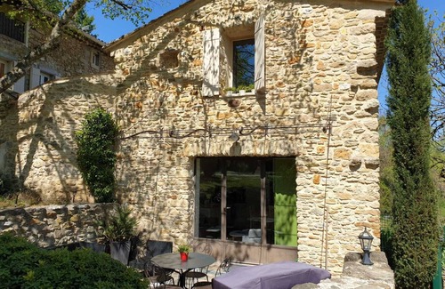 Saint-Marcel-de-Careiret Cottage | Magnificent stone cottage with jacuzzi, swimming pool and large wooded grounds.