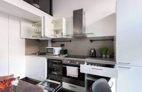 Karlin Apartment | Modern Loft with Balcony Close to City Center