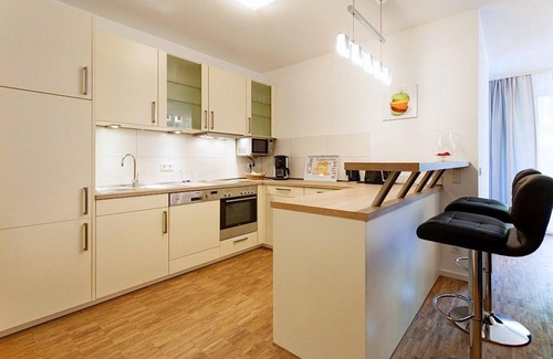 Binz Apartment | Vacation apartment with underfloor heating, wood-burning stove and balcony - only 150 m to the beach