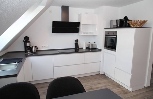 Greetsiel Apartment | Zinnenhuus 2 - Nagelneue Og-wohnung im Grachtenpark Direkt am Wasser!