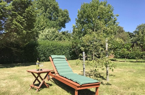 Kopperby Apartment | 110m² large, charming vacation apartment "Schleistern" with wood-burning stove and large, lovingly planted garden with old trees, only 400 m from the Schlei, is wonderfully suited for couples and families who want to get away from the hustle and bustle of