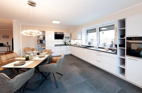 Grasberg Apartment | Above the Rooftops of Grasberg's City