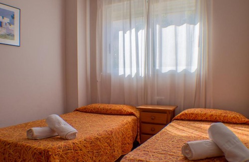 Denia Apartment | Apartamento vistas a jardín y piscina. wifi gratis
