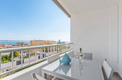 Punta Prima Apartment | Apartment 'Beach Front Sea View Punta Prima' with Sea View, Wi-Fi and Air Conditioning