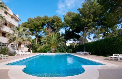 Cala Agulla Apartment | Apartment Drac Blanc 1-4 close to the Beach with Sea View, Pool, Terrace & Wi-Fi