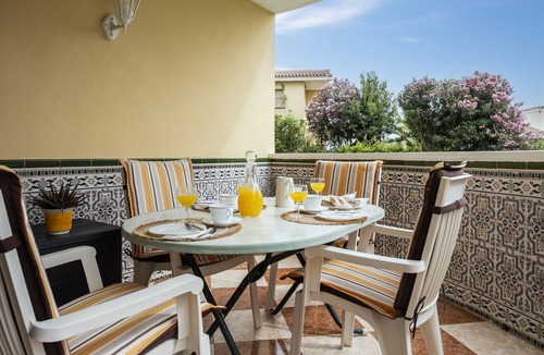 Torre de Benagalbon Apartment | Apartment 'Los Rubios Playa' with Private Terrace, Shared Garden and Wi-Fi