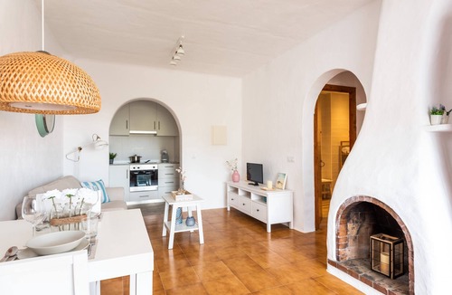 Platges de Fornells Apartment | Apartment 'Vistafaro' with Sea View, Shared Pool and Wi-Fi
