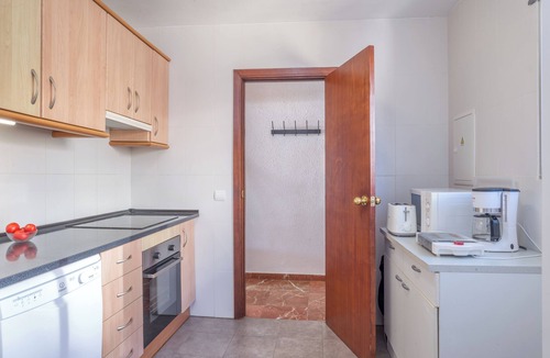 Fuengirola Apartment | Beachfront Apartment with Sea View, Pool, Garden, Terrace, Balcony, A/C & Wi-Fi