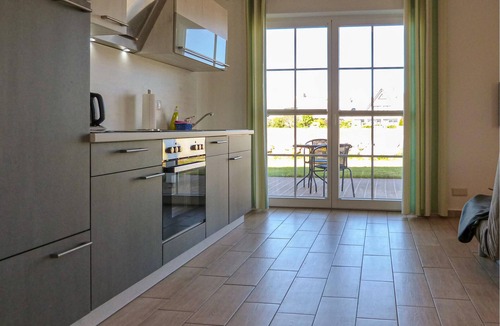 Monchgut-Granitz Apartment | "Between the Baltic Sea beach and the Bodden, the Boddenhus apartment house awaits you with its brig