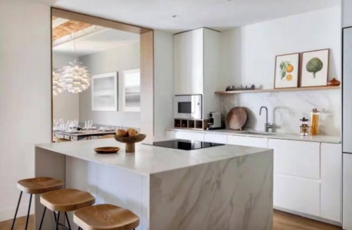 L'Antiga Esquerra de l'Eixample Apartment | Bright Living Spaces with Catalan Charm