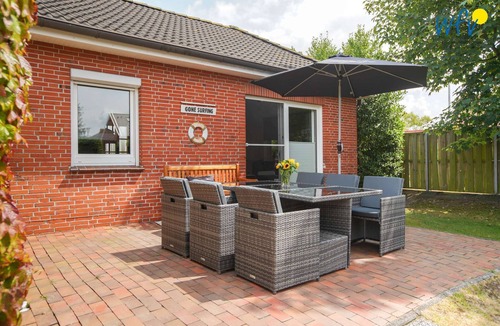 Borkum House | Comfortable bungalow with sunny terrace and garden!