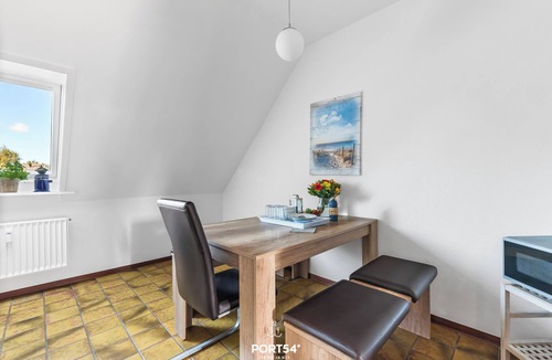 Stinteck Apartment | Cozy vacation apartment on the North Sea with indoor swimming pool and balcony