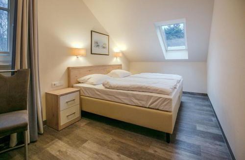 Binz Apartment | Dünenpark Binz - Komfortplus Ferienwohnung mit 2 Schlafzimmern und Balkon im Dachgeschoss 032