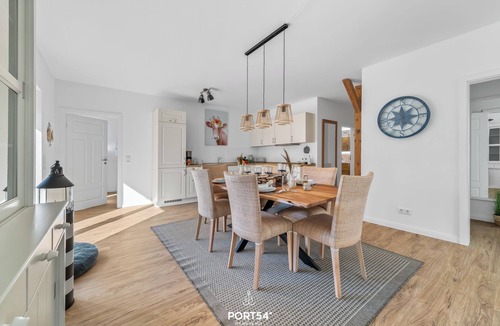 Hedwigenkoog Apartment | Flunder- Moderne Ferienwohnung auf 94 m² mit Balkon und Strandkorb