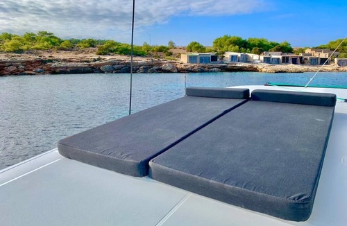 Playa d'en Bossa Boat Rental | Get to know Ibiza from the crystalline and transparent waters of its coves and beaches.