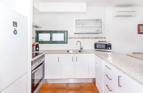 Son Xoriguer House | Holiday Home 'Cala´n Bosch 1a Planta' with Shared Pool, Shared Garden and Air Conditioning