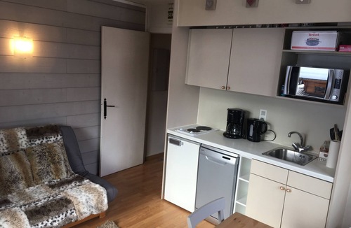 Les Gets Apartment | In the center of the village of Les Gets, ski-in ski-out apartment overlooking the slopes