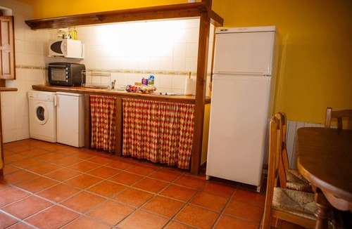 Horcajuelo de la Sierra Ski Chalet | In the Rajalhondo house you can enjoy a front patio with barbecue and garden furniture