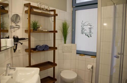 Fehmarn House | Inselblume 48 - Kuschlige Ferienwohnung in der Strandburg