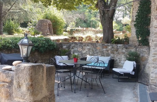 Saint-Marcel-de-Careiret Cottage | Magnificent stone cottage with jacuzzi, swimming pool and large wooded grounds.