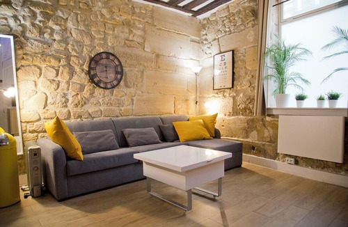 Quartier de la Monnaie Apartment | Newly Renovated Chic Studio with Exposed Stone and Beams