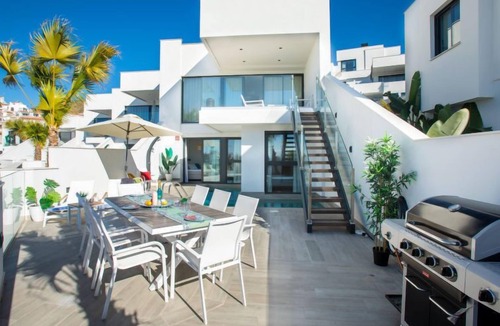 Chimenea House | Royal Palm by Interhome