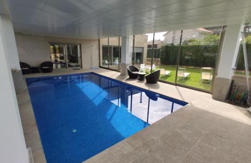 Sanxenxo House | Sanxenxo Casa Rial 47 con PISCINA CLIMATIZADA