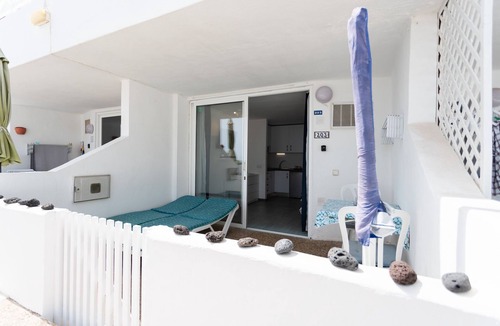 Puerto del Carmen Apartment | Studio , southfacing sea views , own patio, 2 heated pools, overlooking harbour