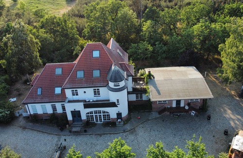 Bornicke House | Time out in a beautiful old train station on the edge of the forest in a large loft