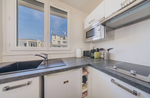 Quartier Saint-Ambroise Apartment | top floor studio between Oberkampf and Canal Saint Martin