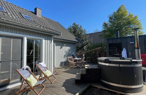 Luckow House | traumHaff®Boatsmanns Domizil Stettiner Haff private NORDICSPA fireplace boat dog