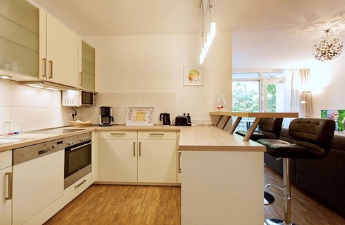 Binz Apartment | Vacation apartment with underfloor heating, wood-burning stove and balcony - only 150 m to the beach