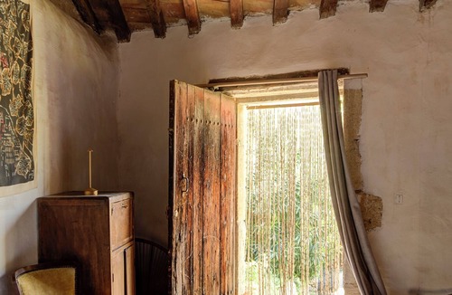 Meynes House | Village house in its original state (under the bell tower)