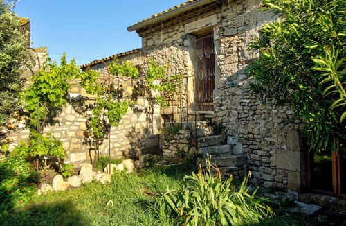 Meynes House | Village house in its original state (under the bell tower)