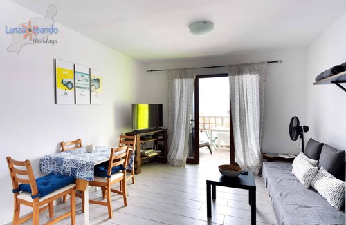 Costa Teguise Apartment | Vivienda Vacacional Golden Sun 2nd floor apt in complex w/pool in Costa Teguise