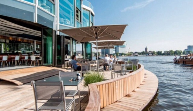 A romantic and unique design house boat on the Amstel river in Amsterdam