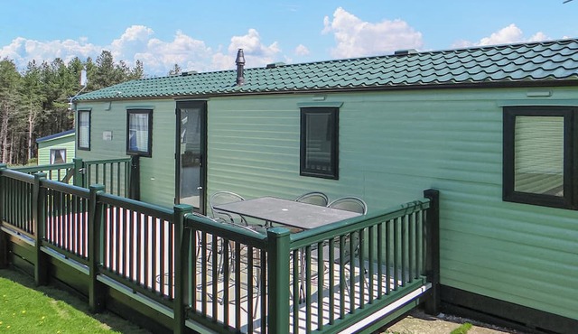 Comfortable and spacious 12ft-wide caravan with one double and one twin.