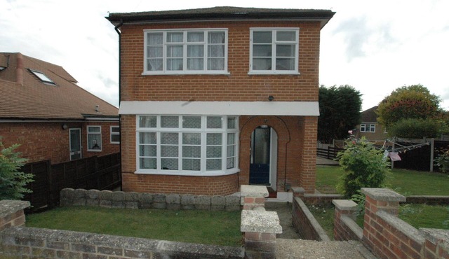 First Floor Studio with seperate double bedroom, within a large detached house.