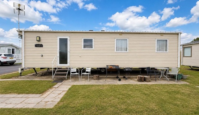 Great caravan with modern furnishings at Dovercourt Holiday Park ref 44007D