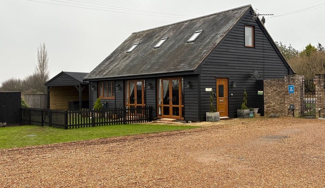 Quiet setting with secure gated parking, children's play area & farm animals